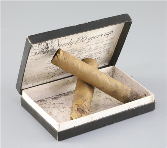 Sir Winston Churchill interest: Two partially smoked cigars,